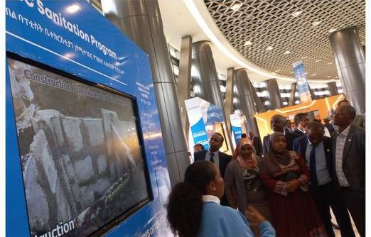 Visitors viewing the market-based sanitation exhibit at the Ethiopian Innovation Centre