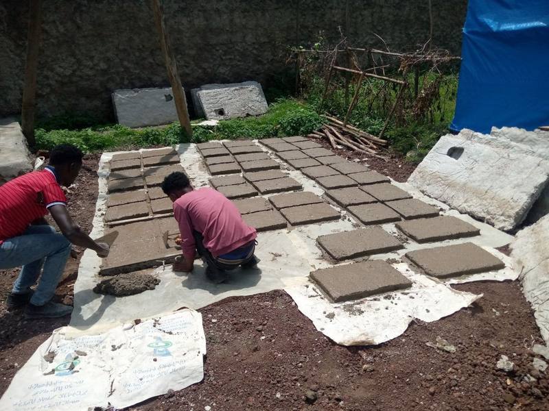 Workers casting precast panels at a local enterprise yard